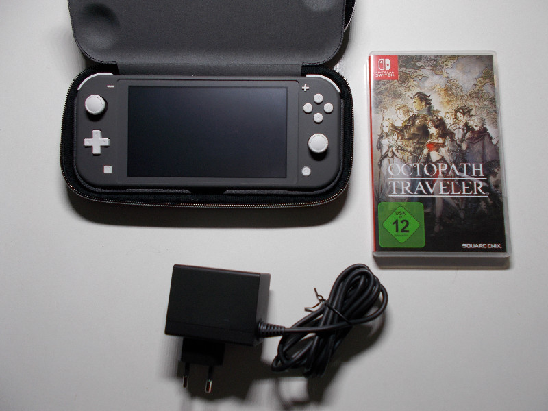 Nintendo Switch Lite grau + Spiel und Zubehör Kaufen!